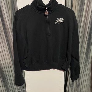 Nike air cropped women’s half zip up sweater.